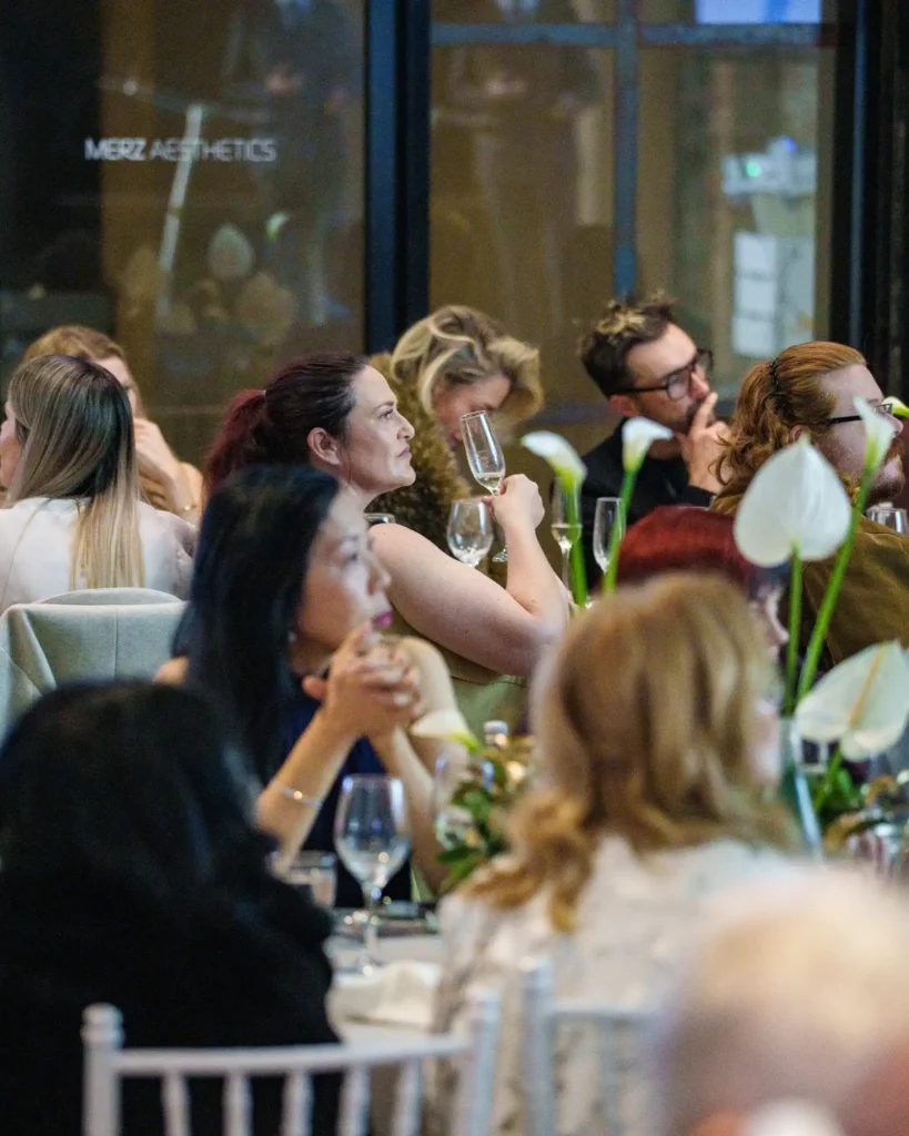 Audience sitting at table at the Merz Aesthetics Ultherapy PRIME Launch & Showcase Dinner – Peanut Productions case study