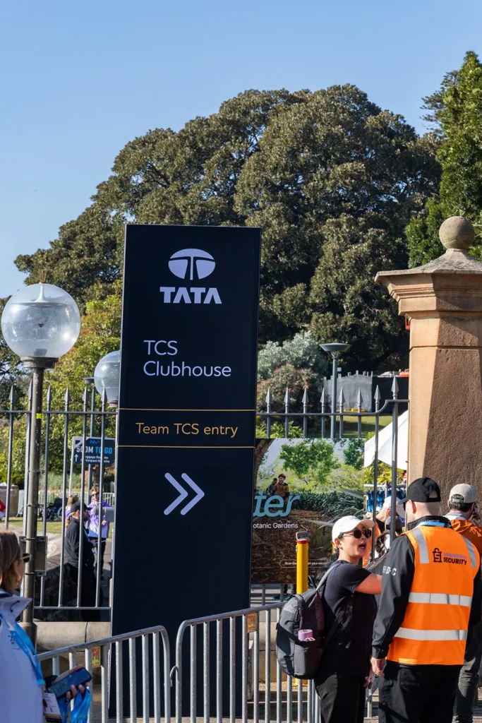 A TCS Clubhouse Sign Pointing to the Pavilion at Tata Consultancy Services TCS Sydney Marathon 2026, Sydney – Peanut Productions Event Management Case Study